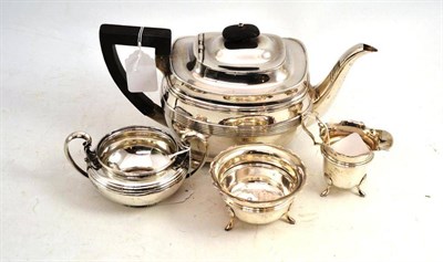 Lot 202 - A teapot, sugar bowl and silver cream and sugar