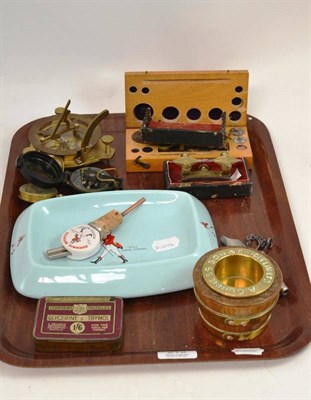 Lot 213 - A tray of collectable items, including a reproduction compass, two pocket compasses, Guinness...