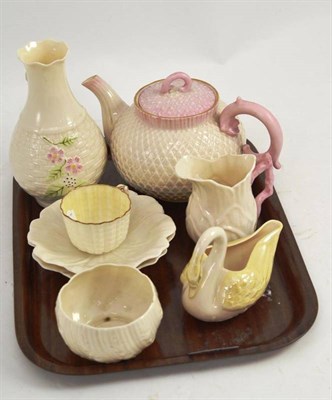 Lot 237 - Belleek teapot and lid, a vase, two jugs, a cup, two saucers and a sugar bowl (9)