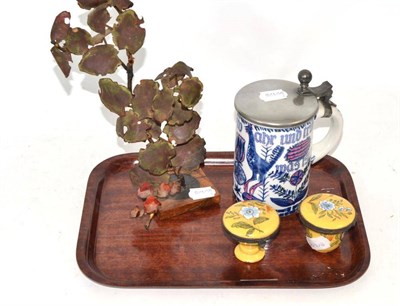 Lot 239 - Two faience yellow boxes with covers, tankard, copper leaf ornament