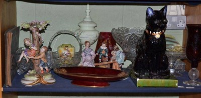 Lot 249 - A shelf including a Capodimonte figural group, glassware, Carltonware dish, large ceramic black...