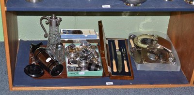 Lot 251 - A quantity of table lighters, cased carving set, plated ware etc