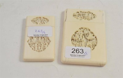 Lot 263 - A Cantonese export carved ivory card case, 8.5cm x 5cm and another similar 10.5cm x 7cm