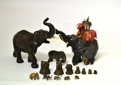 Lot 161 - An Austrian Cold Painted Bronze Small Elephant, circa 1900, the angry mammal holding a young...