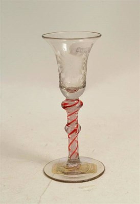 Lot 269 - Dual colour spiral twist engraved wine glass with chamfered foot