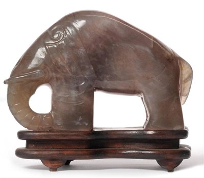 Lot 162 - A Chinese Moss Agate Elephant Ornament, late Qing Dynasty, the agate of grey colour with opaque...