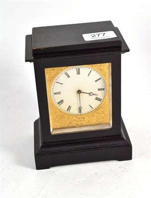 Lot 277 - An ebonised mantel timepiece