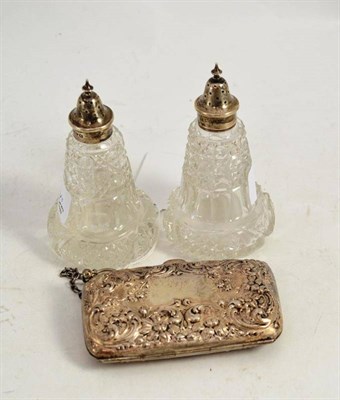 Lot 279 - A silver hallmarked purse and silver topped salt and pepper