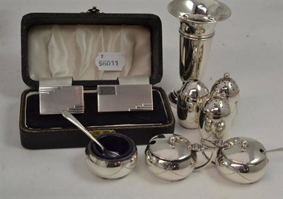 Lot 285 - Silver spill vase, two cased silver napkin rings, silver condiments etc