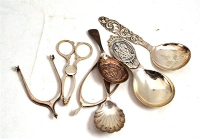 Lot 300 - Four silver caddy spoons, a pair of novelty sugar nips in the form of a spur, another as a...