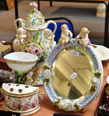 Lot 318 - A Dresden mirror, centrepiece, Staffordshire vase and a Caverswall bough pot