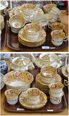 Lot 321 - A 19th century English gilt decorated tea service