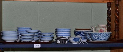 Lot 329 - Two trays of 19th century and later blue and white Oriental ceramics, tea bowls etc