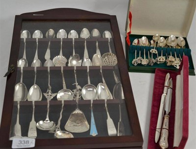 Lot 338 - A collection of mostly silver spoons including bright cut examples, caddy spoons etc in a...