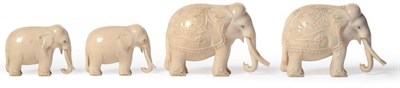 Lot 169 - A Pair of Indian Carved Elephant Ivory Figures of Standing Elephants, circa 1880, each with...