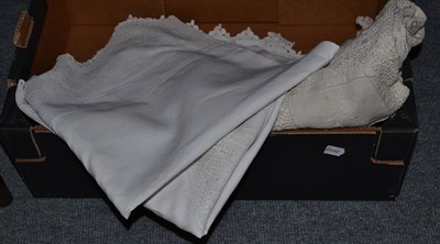 Lot 399 - Cream linen patched and embroidered bed cover with crochet inserts, white linen cloths and...