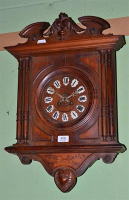 Lot 406 - A walnut Vienna-style spring driven wall clock