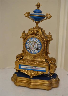 Lot 408 - A gilt metal and porcelain mounted mantel clock