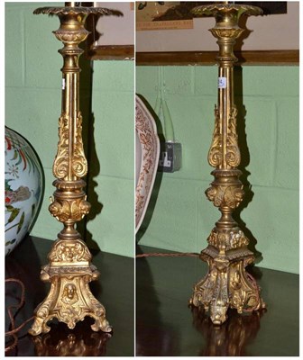 Lot 424 - Pair of French church brass candlesticks converted to lamps