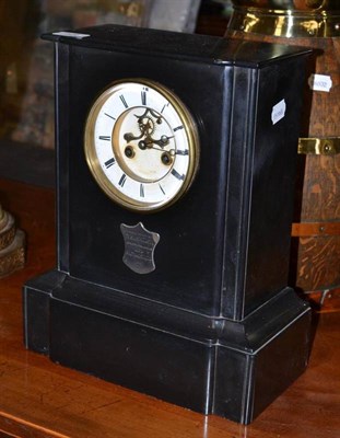 Lot 428 - A black slate mantel clock with brocot escapement pendulum and key