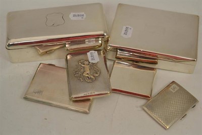 Lot 460 - Three silver cigarette cases and an aide-mémoire decorated with a cherub