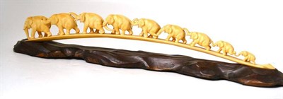 Lot 179 - A Japanese Carved Ivory Bridge of Nine Elephants, late Meiji period (1868-1912), incised three...