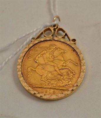 Lot 498 - A 1912 whole sovereign loose mounted as a pendant