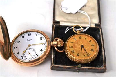 Lot 515 - An 18ct gold pocket watch (a.f.) and a gold plated pocket watch