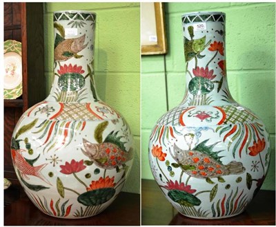 Lot 520 - A large pair of Chinese vases, decorated with fish, 64cm high