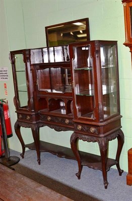 Lot 524 - A late 19th/early 20th century mahogany display cabinet with an arrangement of three cabinets...