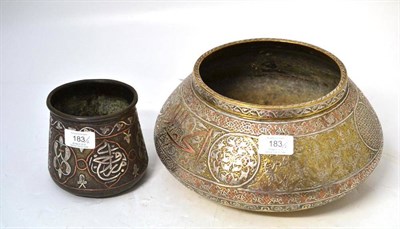 Lot 183 - A Cairoware Silver and Copper Inlaid Brass Bowl, late 19th century, decorated with panels of script