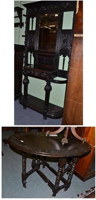 Lot 533 - A Victorian carved oak hall stand, 105cm wide; a similar wall shelf, 128cm wide; and a similar...