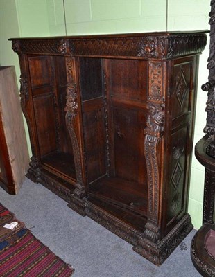 Lot 534 - A Victorian carved oak open bookcase, 150cm wide