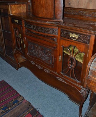 Lot 539 - An Edwardian carved walnut side board/display cabinet