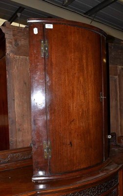 Lot 540 - Georgian bow fronted wall hanging corner cupboard