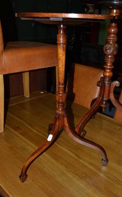 Lot 548 - A 19th century tripod table