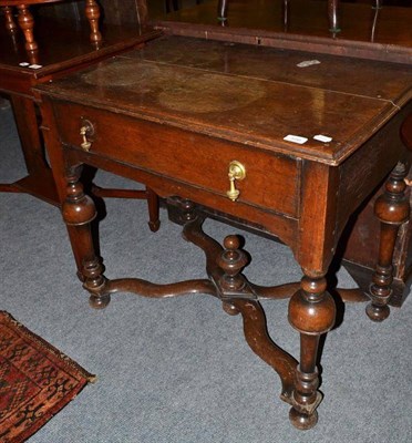 Lot 556 - A 17th century oak lowboy with single drawer and X-stretcher, 83cm wide