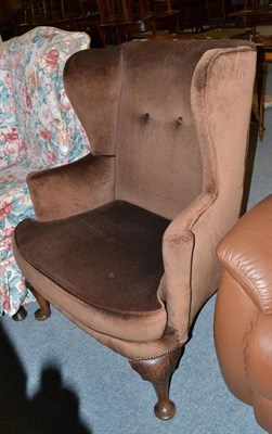 Lot 575 - A Georgian wing back armchair