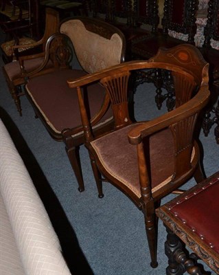 Lot 579 - An Edwardian inlaid settee, an Edwardian tub armchair and another