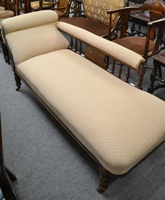 Lot 581 - A 19th century cream upholstered chaise longue