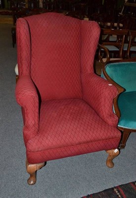 Lot 585 - Edwardian wing armchair