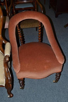 Lot 589 - A Victorian upholstered armchair with barley twist supports