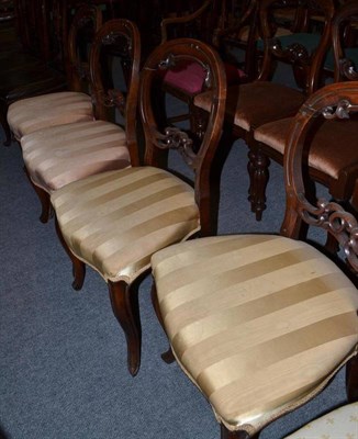 Lot 603 - A set of four Victorian balloon back dining chairs