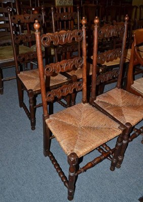 Lot 607 - A set of four ladder back rush seated chairs