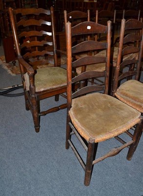 Lot 609 - A harlequin set of nine 19th century rustic rush seated ladder back kitchen chairs