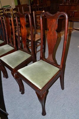 Lot 612 - A set of four mahogany dining chairs with drop in seats