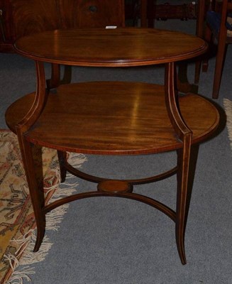 Lot 614 - An inlaid mahogany oval etagere