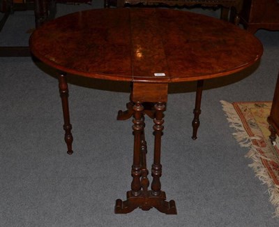 Lot 617 - A Victorian burr walnut Sutherland table