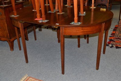 Lot 618 - A mahogany D-end dining table with extra leaf, 165cm long