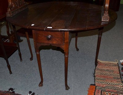 Lot 632 - A mahogany drop leaf table with single drawer and scroll feet